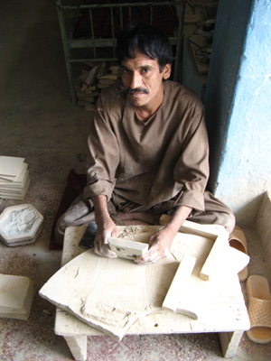 Tile factory: grinding tiles to size, Mazar-e Sharif, Afghanistan 2009