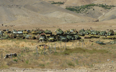 Ex-Soviet tank & Katyusha corral., Panjshir Valley, Afghanistan 2009