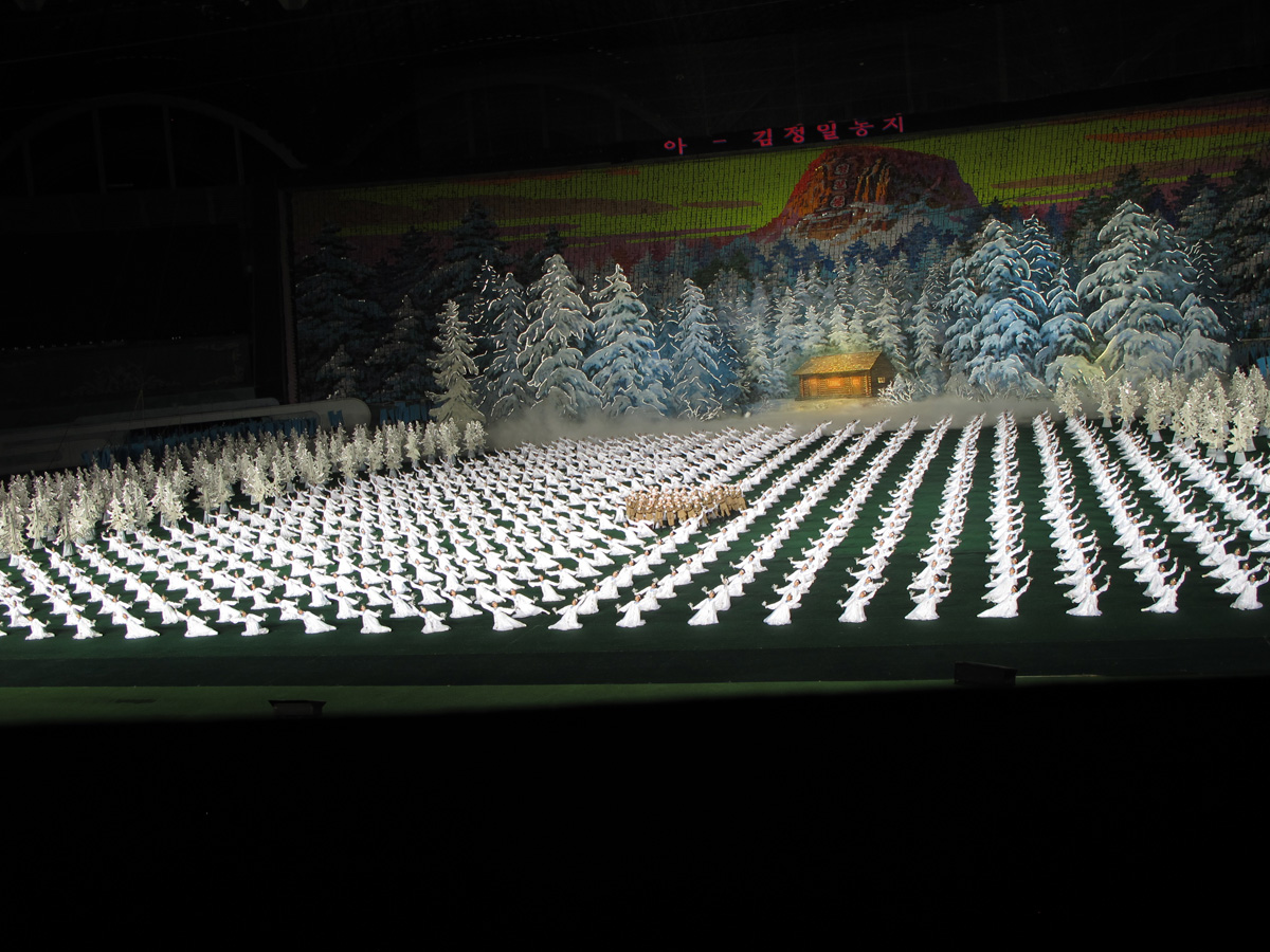 North Korea - Mass Games, Birth of Kim Jong Il in log cabin