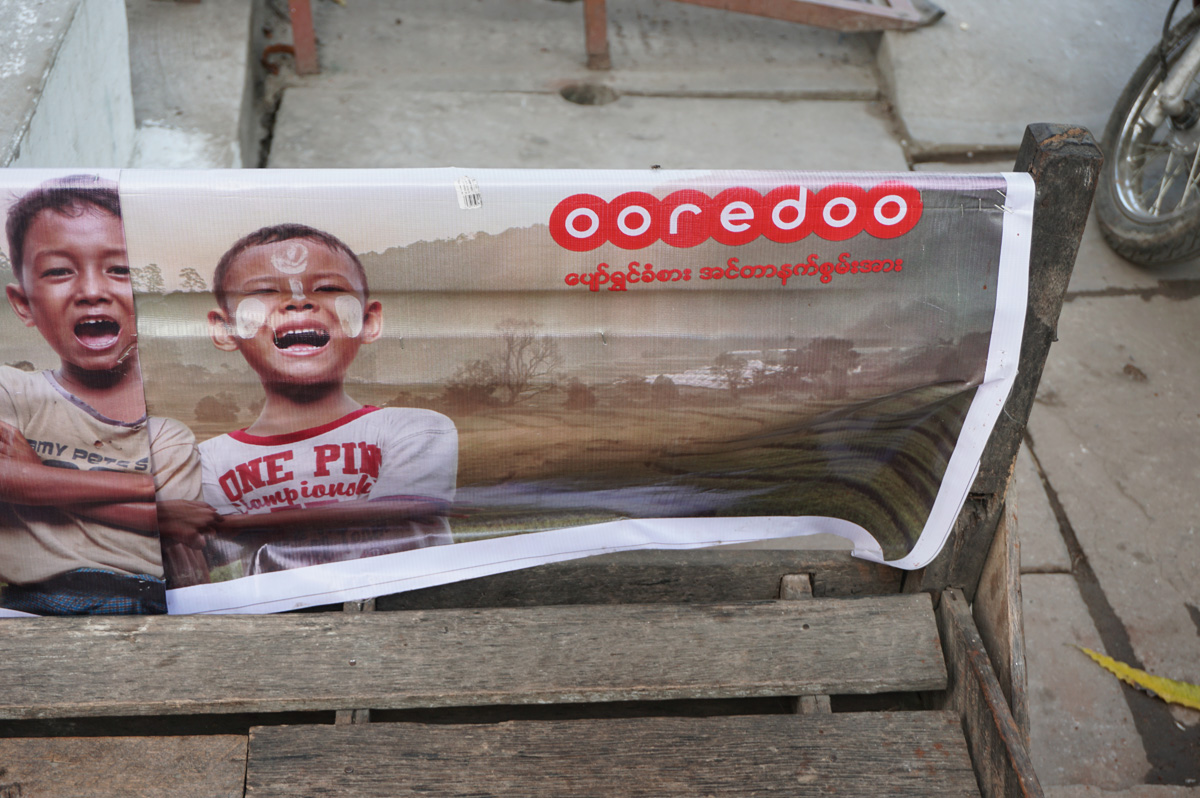 Mandalay, Phone advert, of child with traditional face powder