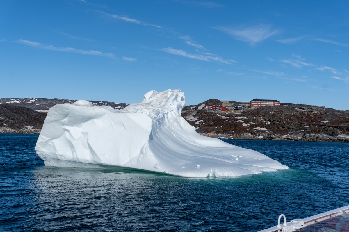 Disko Bay Glacier Cruise, Big Ice near Ilulissat.  With Actic Hotel in background