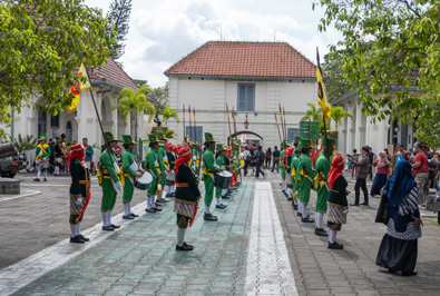 Odd parade of "regiments" in "historic" costume, Dutch Fort Vredeburg, Indonesia 2022 - Java