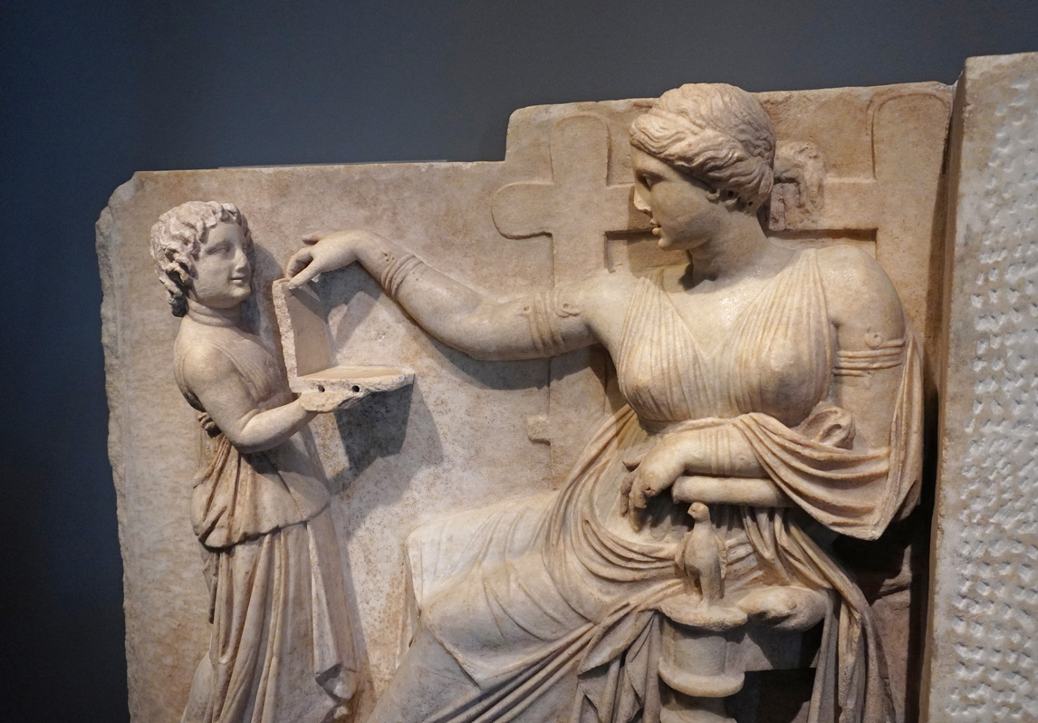 The Getty Villa, Woman Checking Facebook.  ~100 BC Gravestone of Woman with Attendant