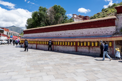 A wall of prayer wheels, Barkhor Circuit, Tibet 2023