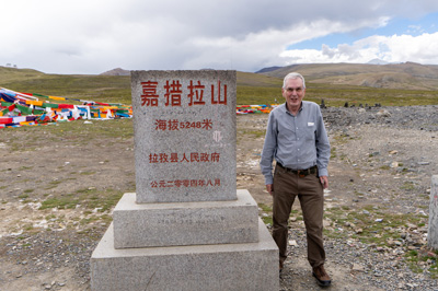 Graham at Gyatso La pass The sign says 5248m, my GPS said 5195m, Shigatse to Shegar, Tibet 2023