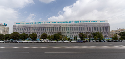 Another building under repair behind a fabric facade, Almaty, Xinjiang + Kazakhstan, 2023
