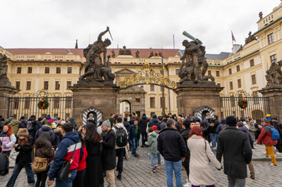 Prage Castle, main gate. With wrestling Titans, Prague Castle, Czechia, December 2023