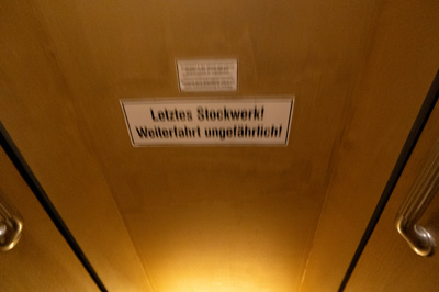 "Last floor!  It is safe to continue!", Paternoster Elevator, Germany - December 2023