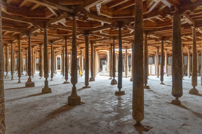 Juma Mosque interior A forest of wooden pillars, Around Khiva, Uzbekistan 2023