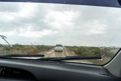 Rain, 21 miles NW of Moynaq, on old sea bed, Driving across the Aral Sea bed and then the Ustyurt Plateau, Uzbekistan 2023